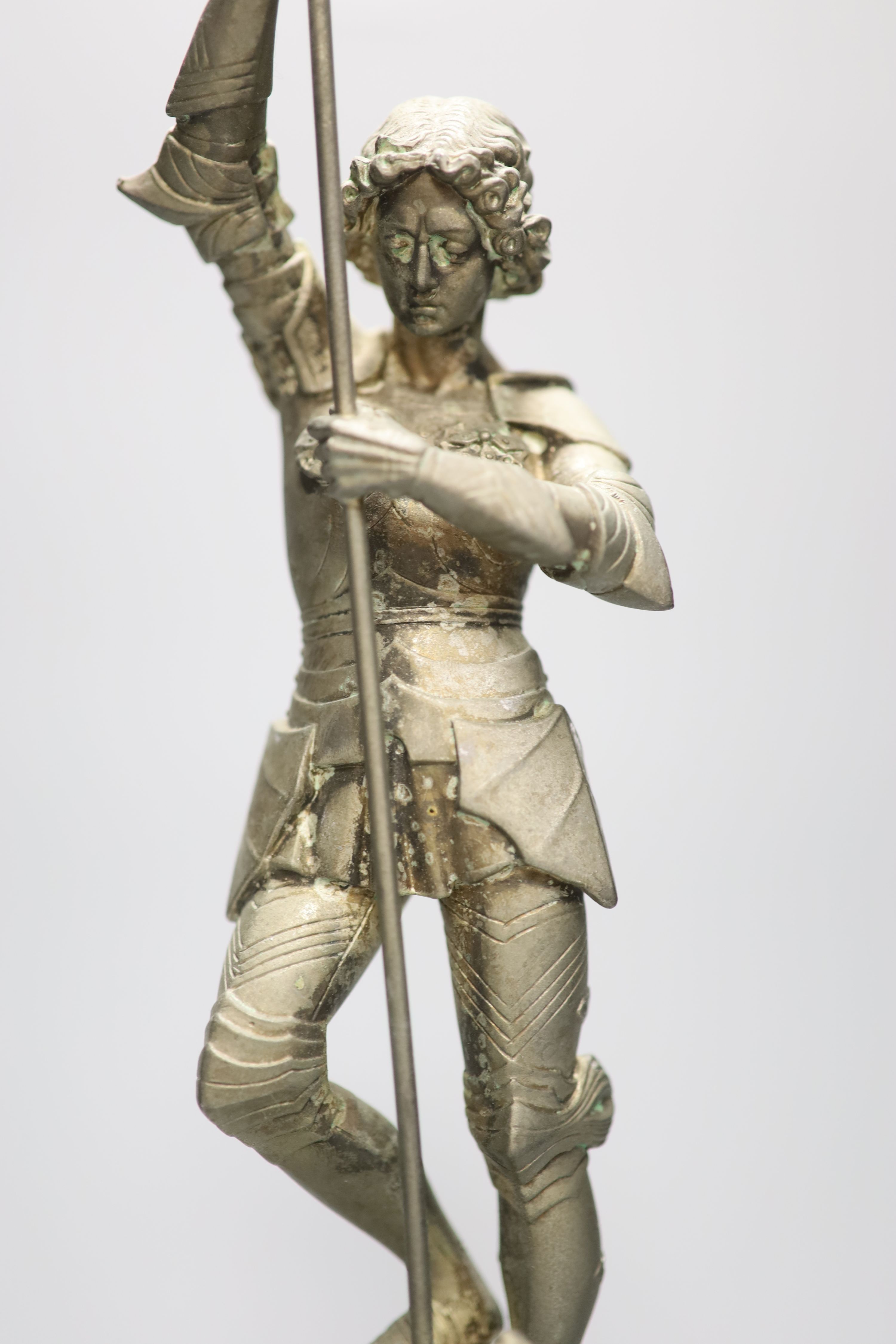 A spelter figure of St George and the Dragon, on turned marble base with vacant silver cartouche, height 41cm